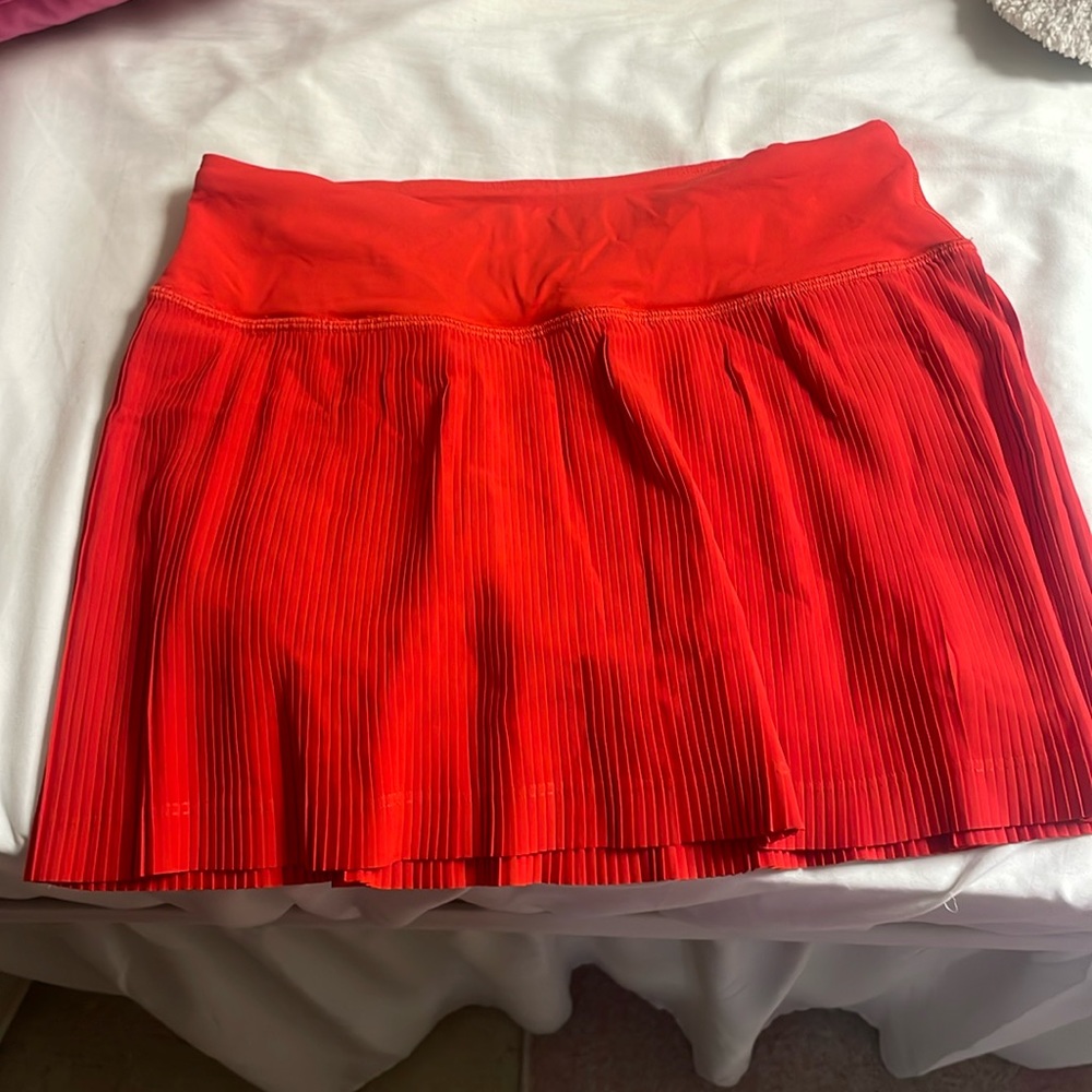 Red Lululemon pleat to street mid rise skirt